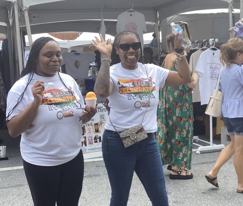 A crowd playing a Rewind That! trivia activation at an outdoor festival
